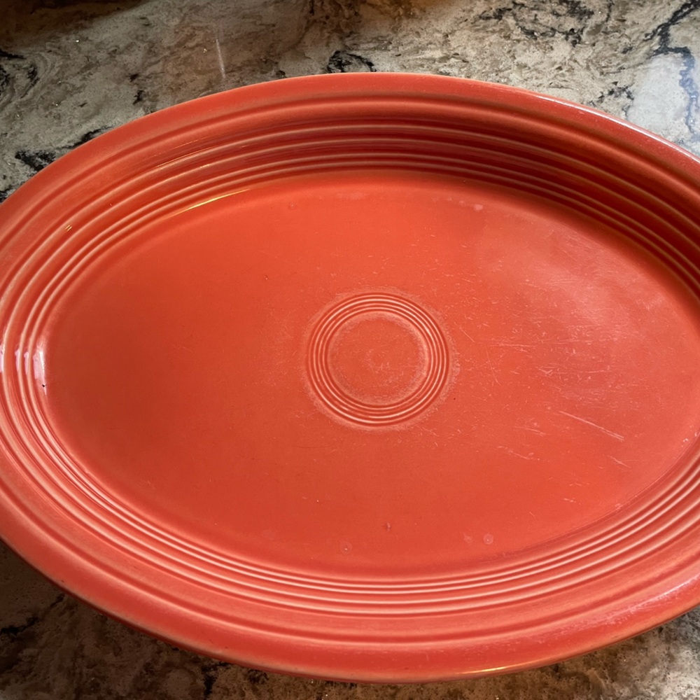 Fiestaware large, coral color, dinner plate